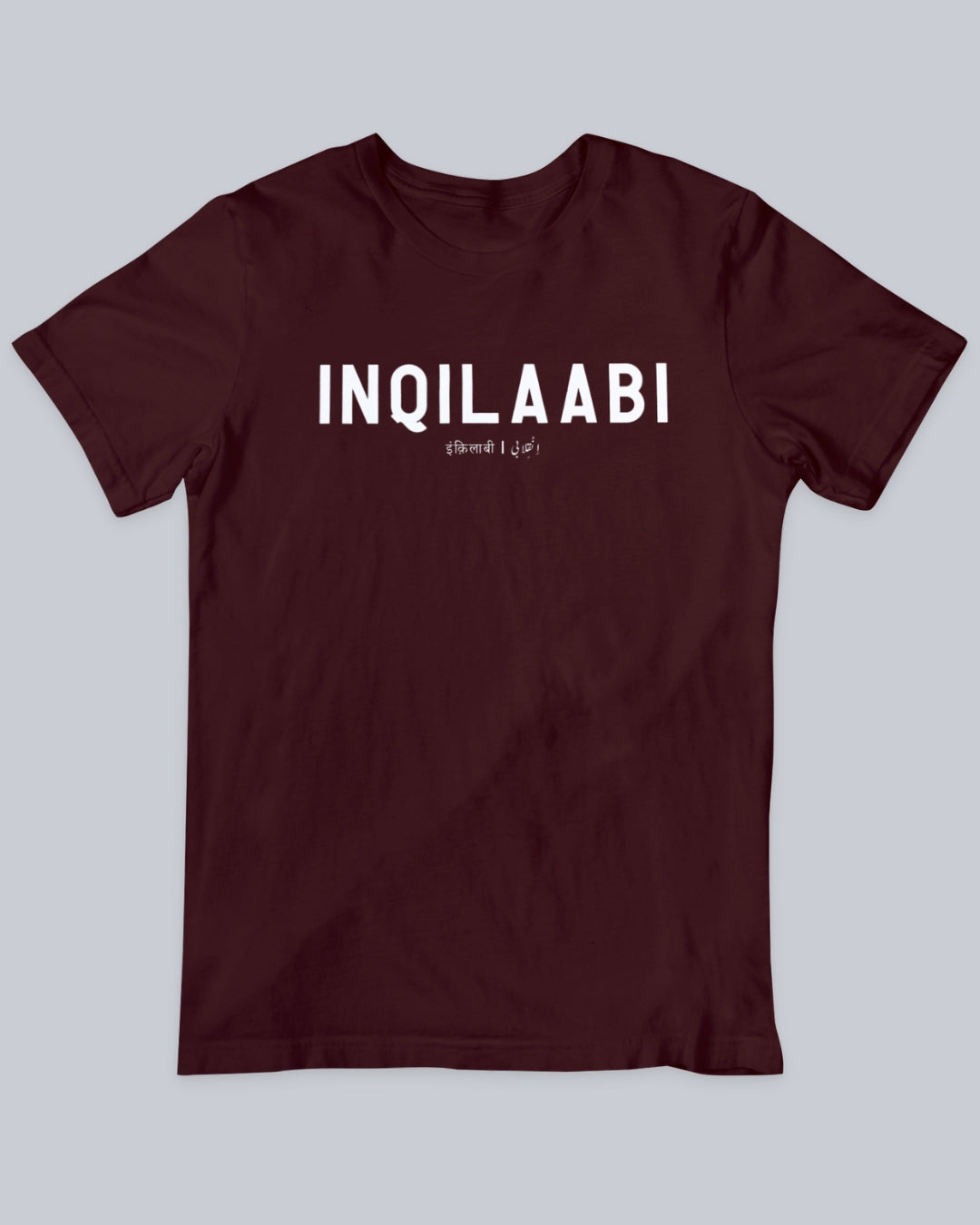 Inqilaabi Unisex T-shirt available in Maroon, Black & White.  Urdu Tshirt, Poetry Tshirt, Shayari Tshirt, Rekhta Tshirt, Rekhta Store Merchandise.